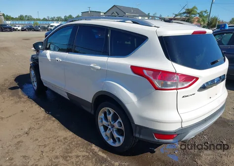2014 Ford Escape Titanium z USA, uszkodzony, nr VIN 1FMCU9J93EUA35713